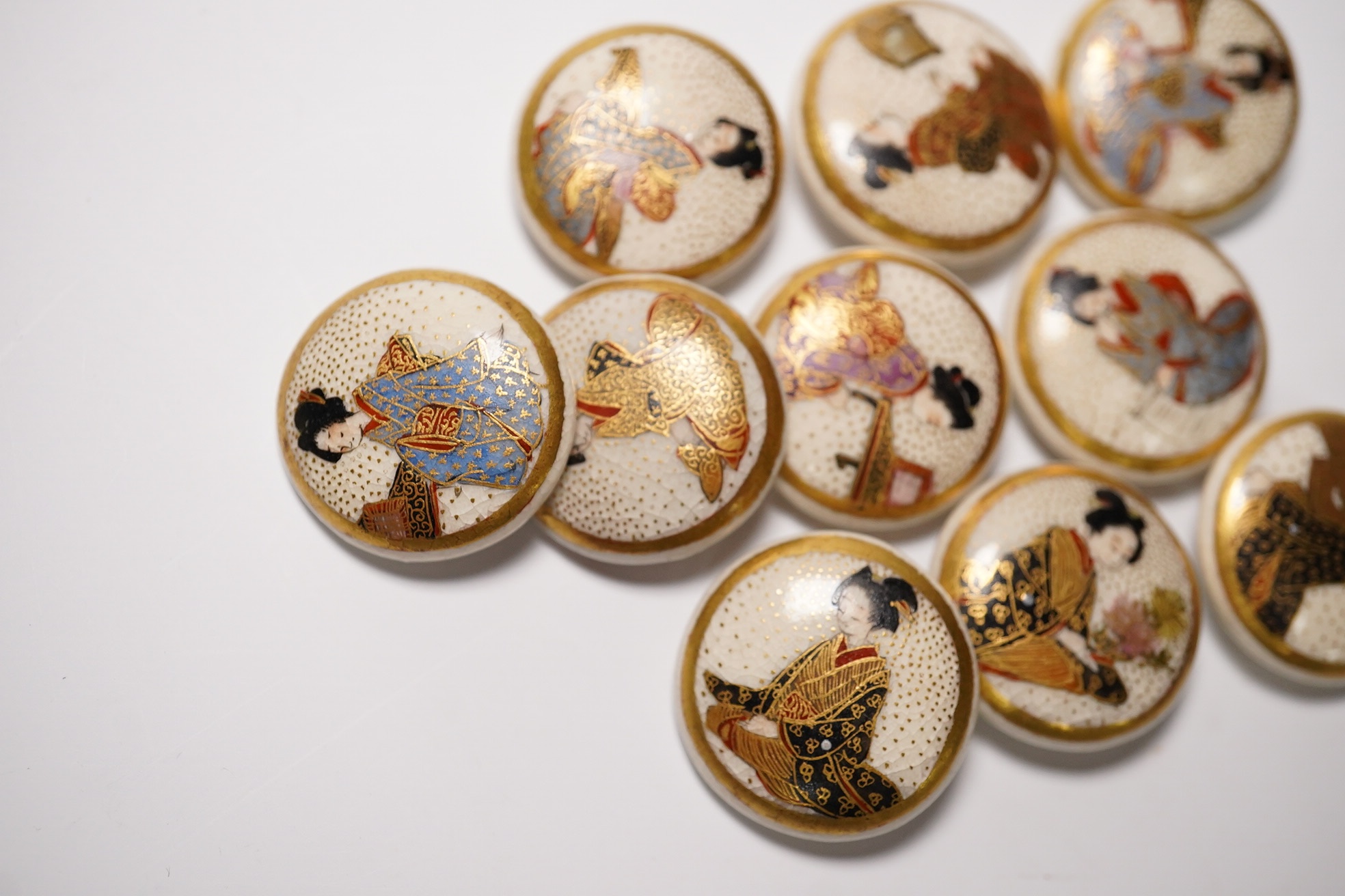 Ten Japanese Satsuma buttons decorated with bijin girls, 19mm diam. Condition - good